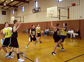 Senior guys play basketball