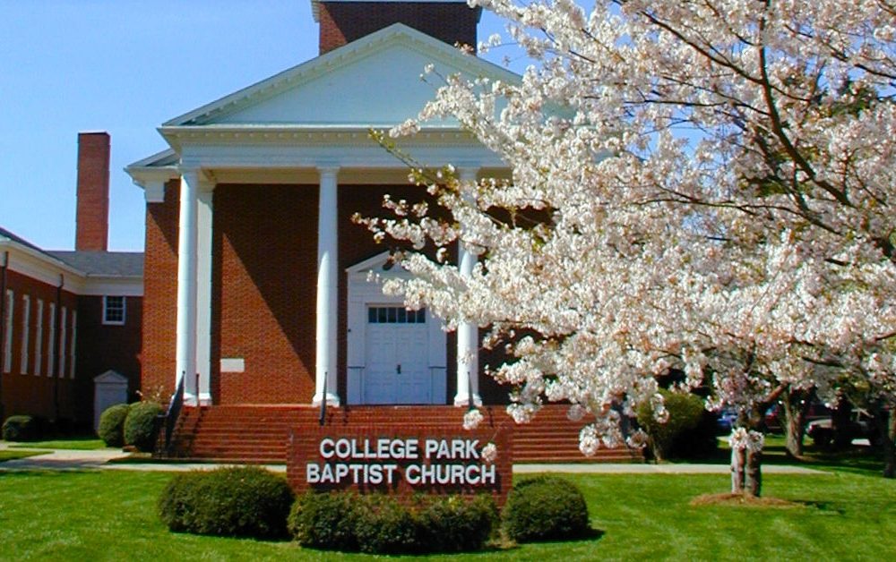 College Park Baptist Church with dogwood tree